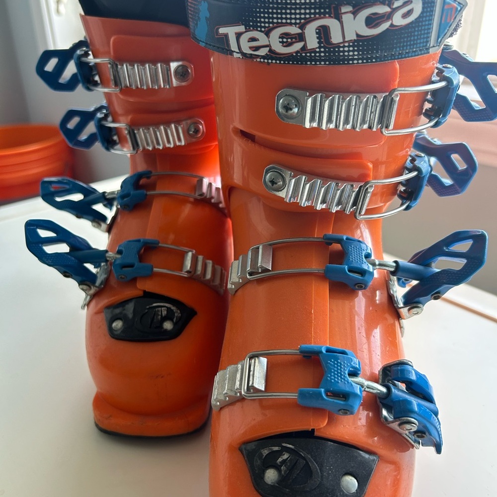 Tecnica Boys Vibrant Orange Ski Boots with Blue Highlights